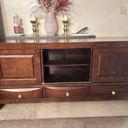 Dark brown ,68in in length 32in height  16.5in width