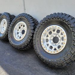 17" KMC KM444 beadlocks w/ 35x12.50R17 Toyo Open Country MT tires 