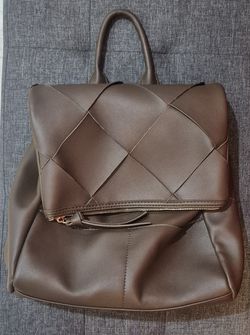Brown purse backpack with handle