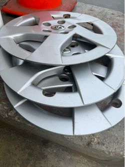 3 2014 Toyota Prius hubcaps