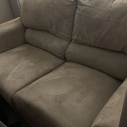 Beige love seat