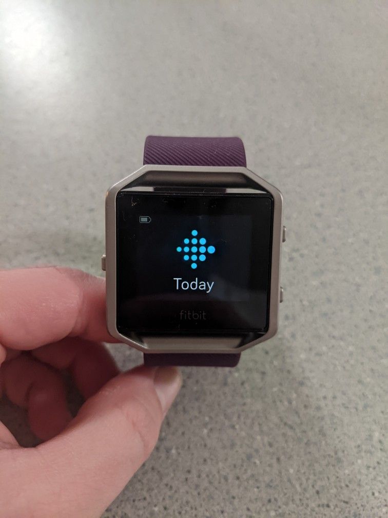 Fitbit Blaze with purple band. Great condition. Comes with charger. 