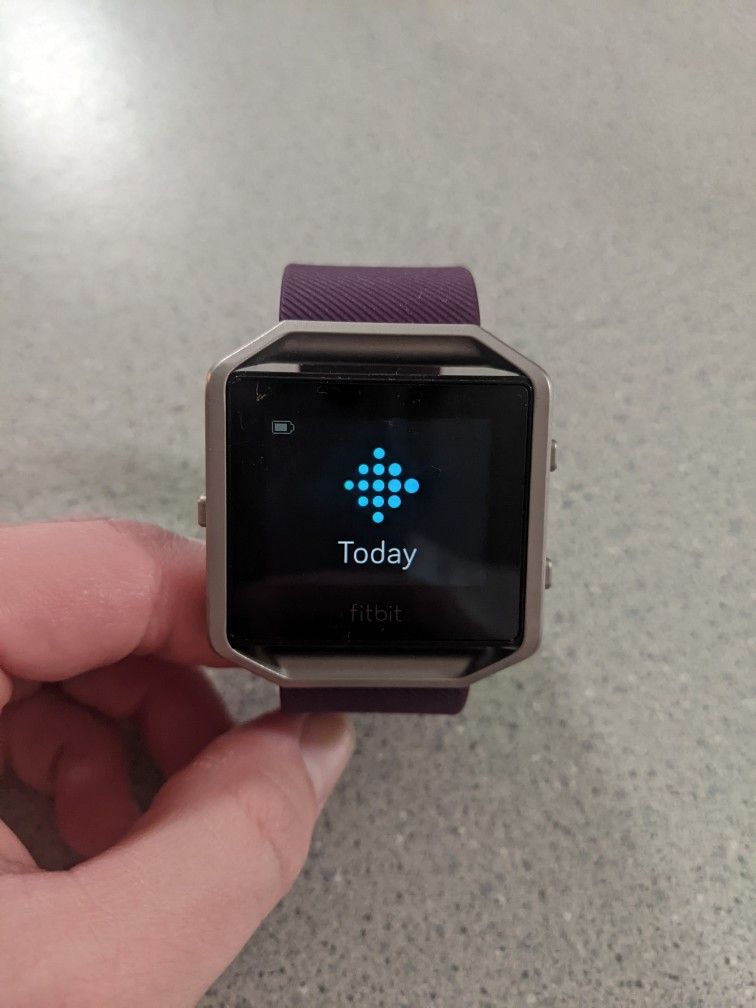 Fitbit Blaze with purple band. Great condition. Comes with charger.