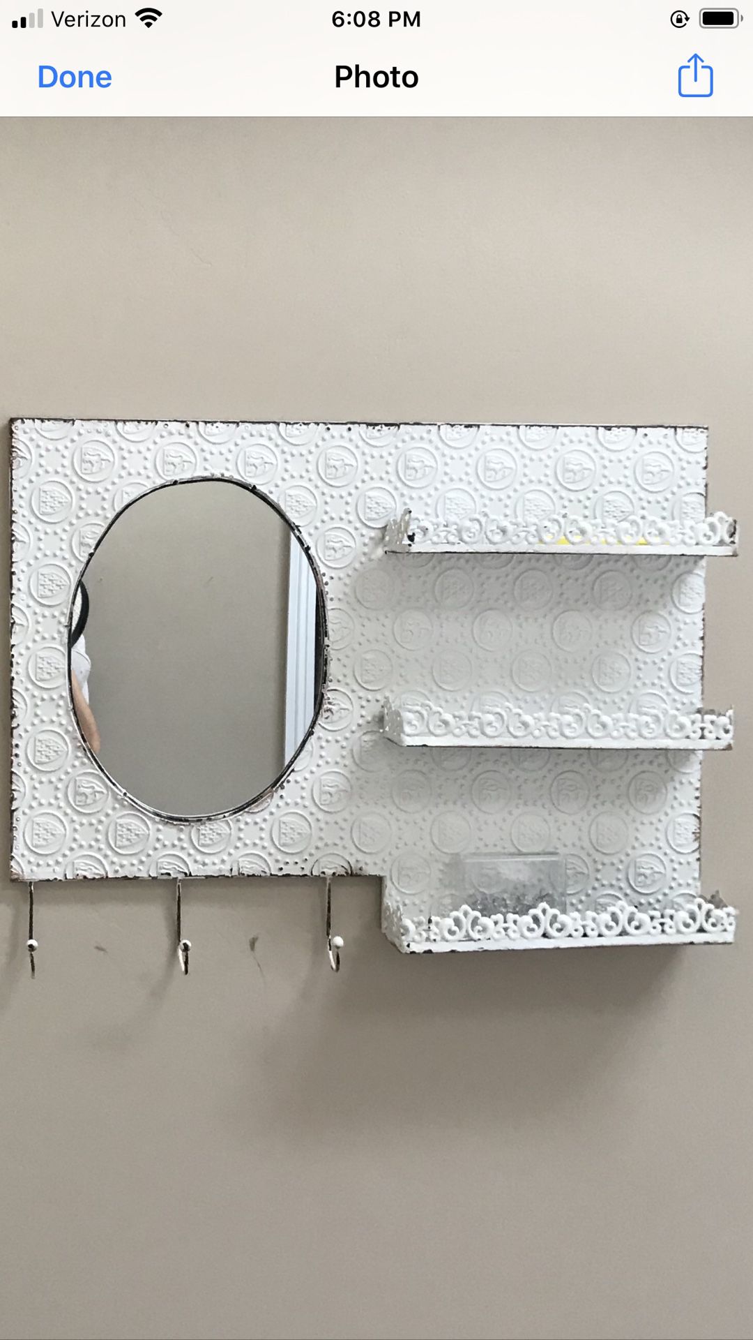 Wall mirror with three shelves and hooks. Distressed and darling