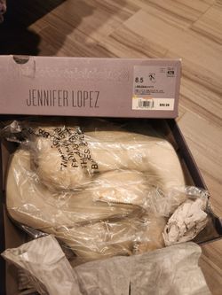 Jennifer Lopez calf high heel boots