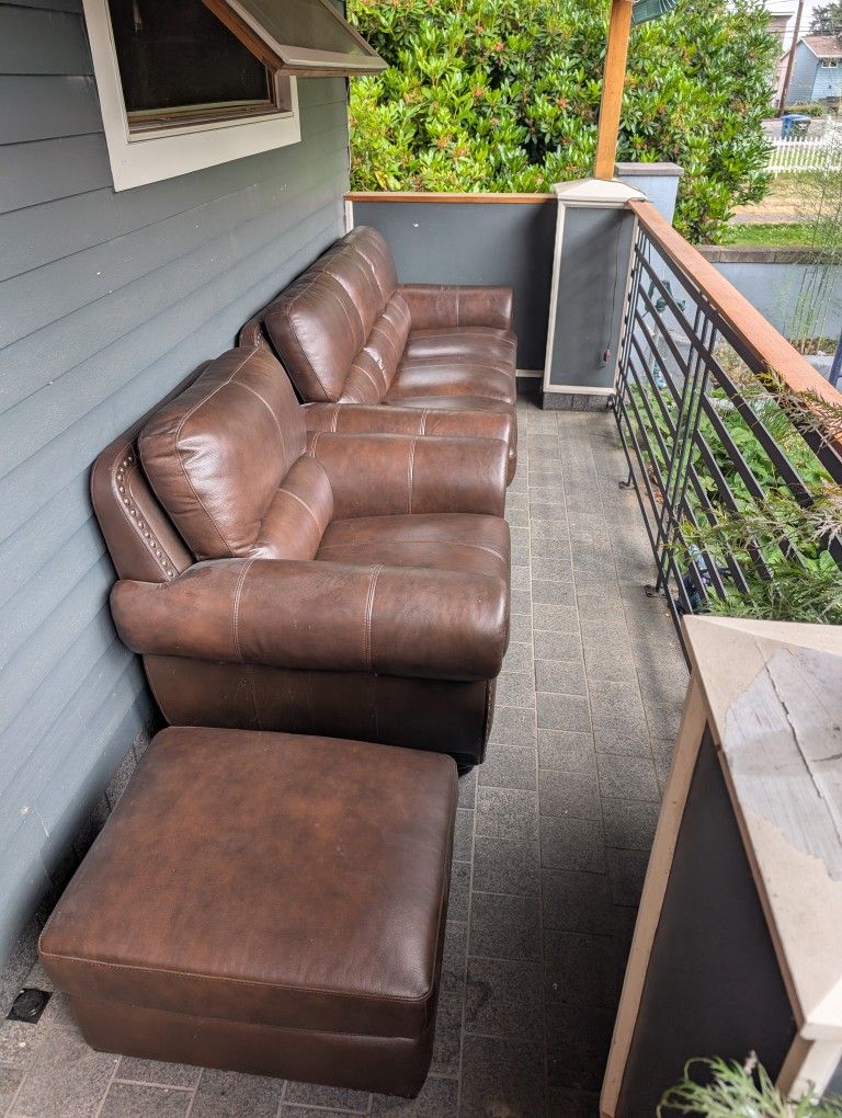 Leather Couch,Love Seat And Ottoman.
