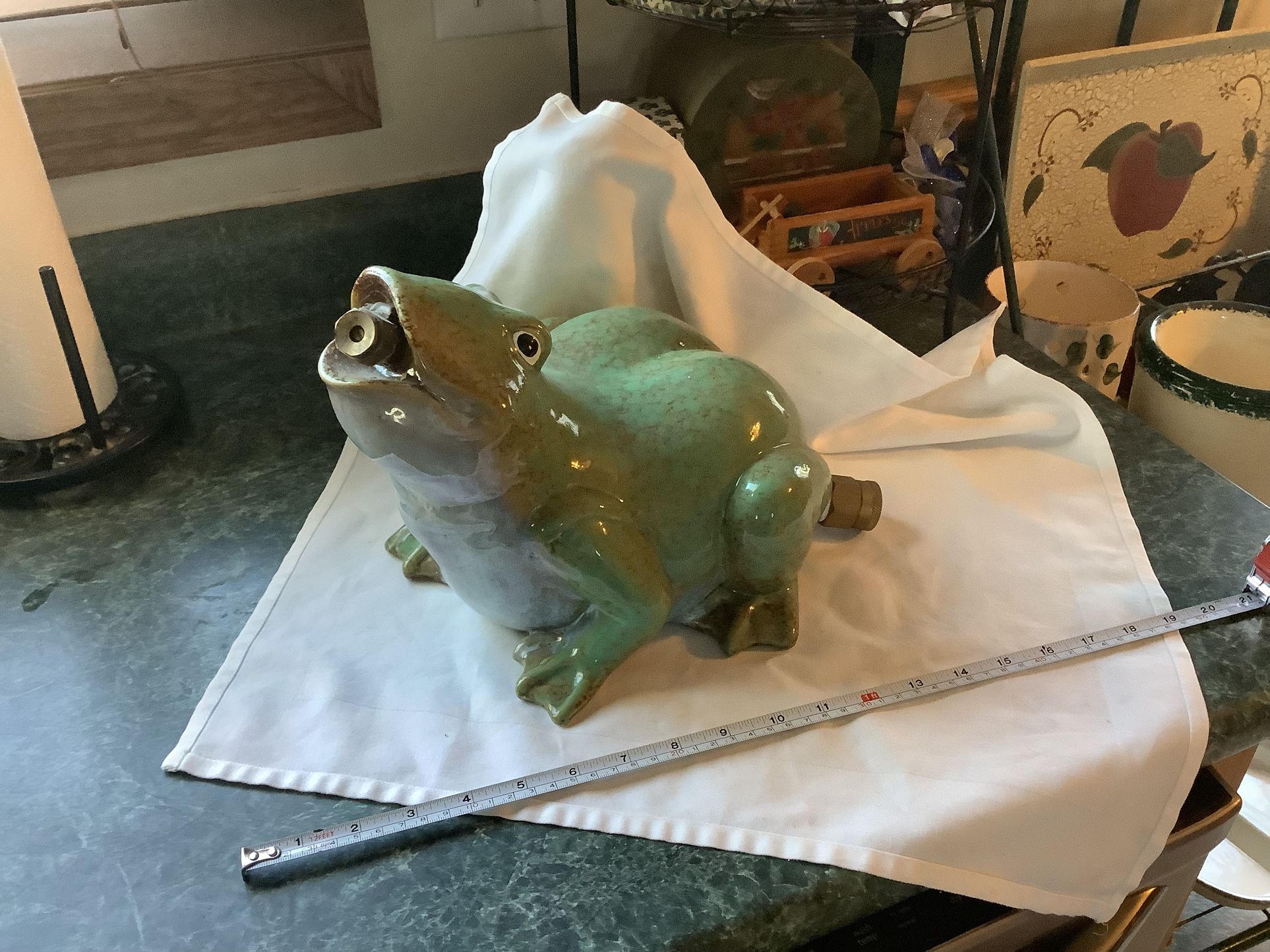 Large sprinkler frog attach hose to rear and sprinkler out of mouth. Approximately 18” long and has Great Details And Color