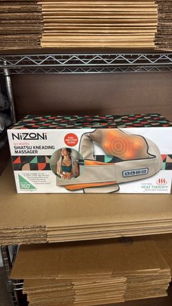 Nixon i Shih Tzu needing massager brand new inbox never opened never used