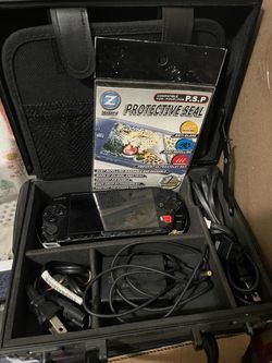 Sony PSP Bundle with Case/ Charger/ Games