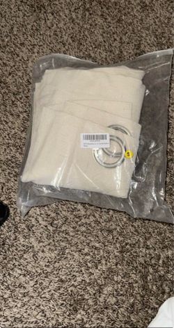 2 Large window curtains: 63" length and 41" width per panel