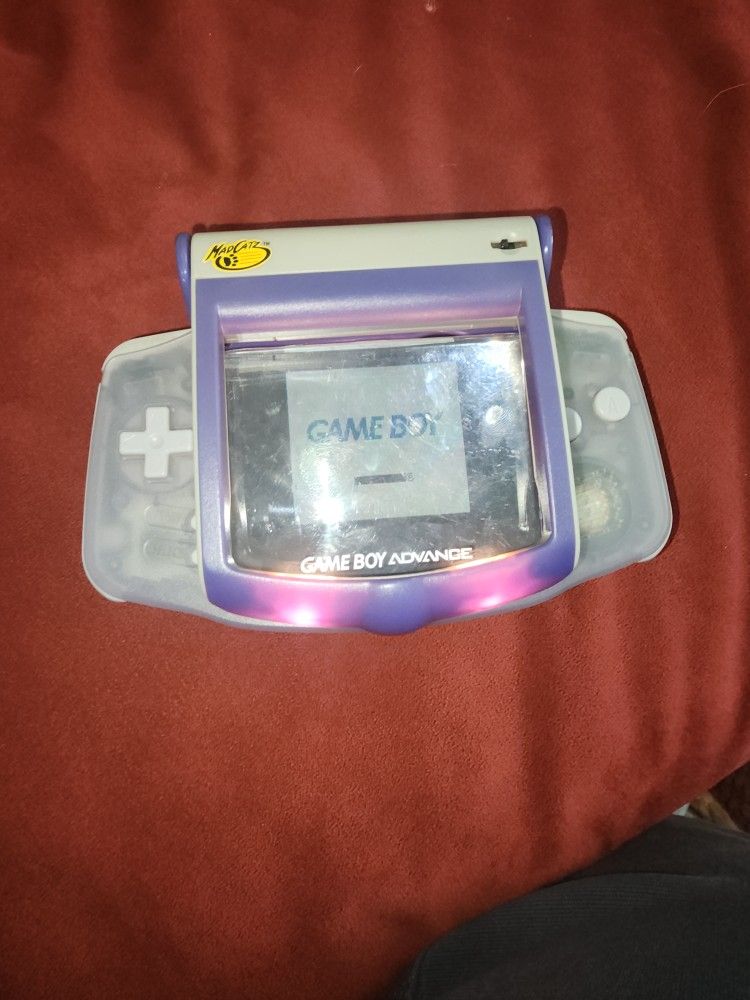 Gameboy advance comes with light attachment and case