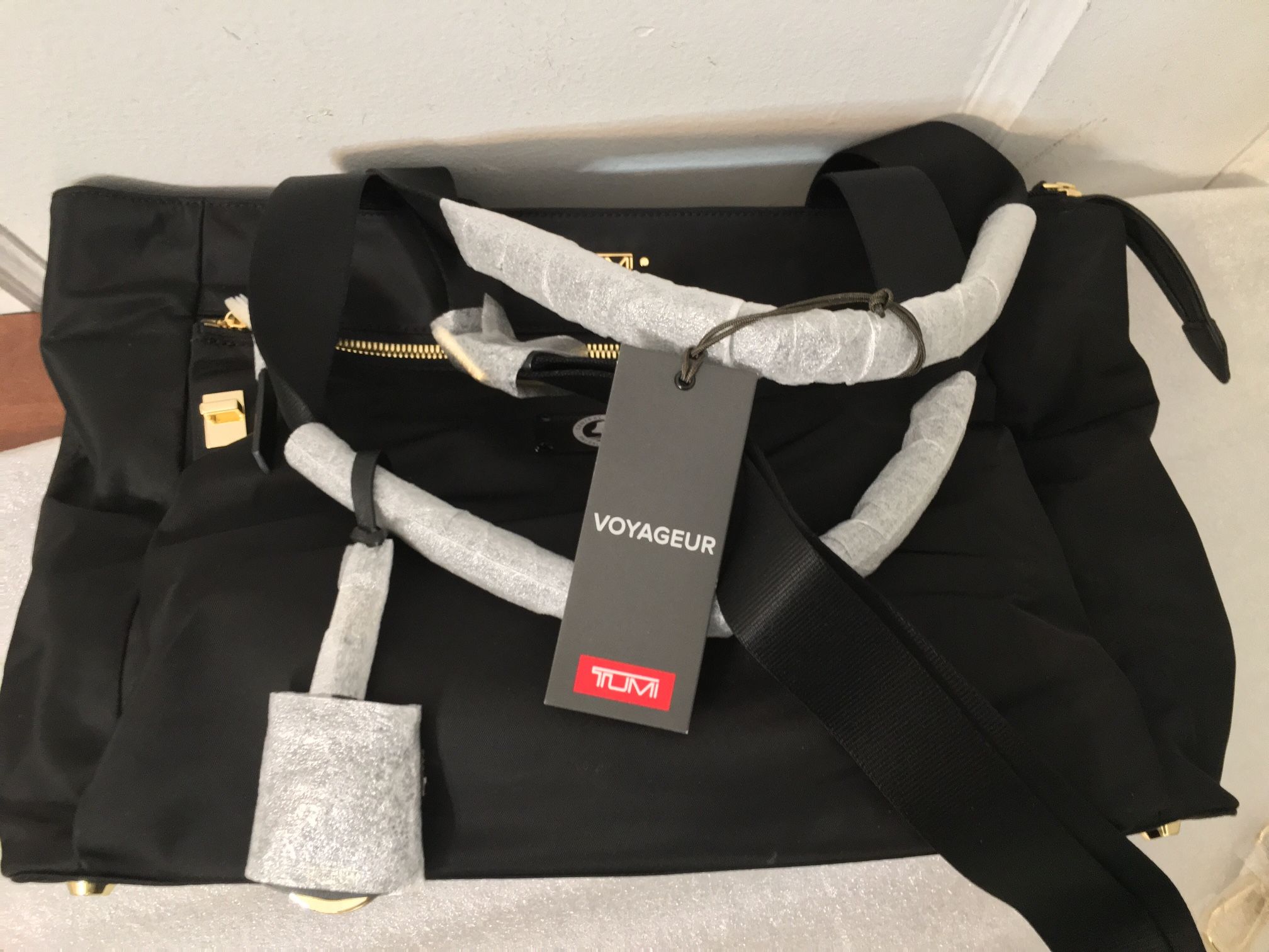 Tumi Voyageur Mauren Tote. Brand new with tag and all sealed still in it. Dimensions on tag