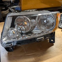 2012 Grand Cherokee Driver Side Headlight