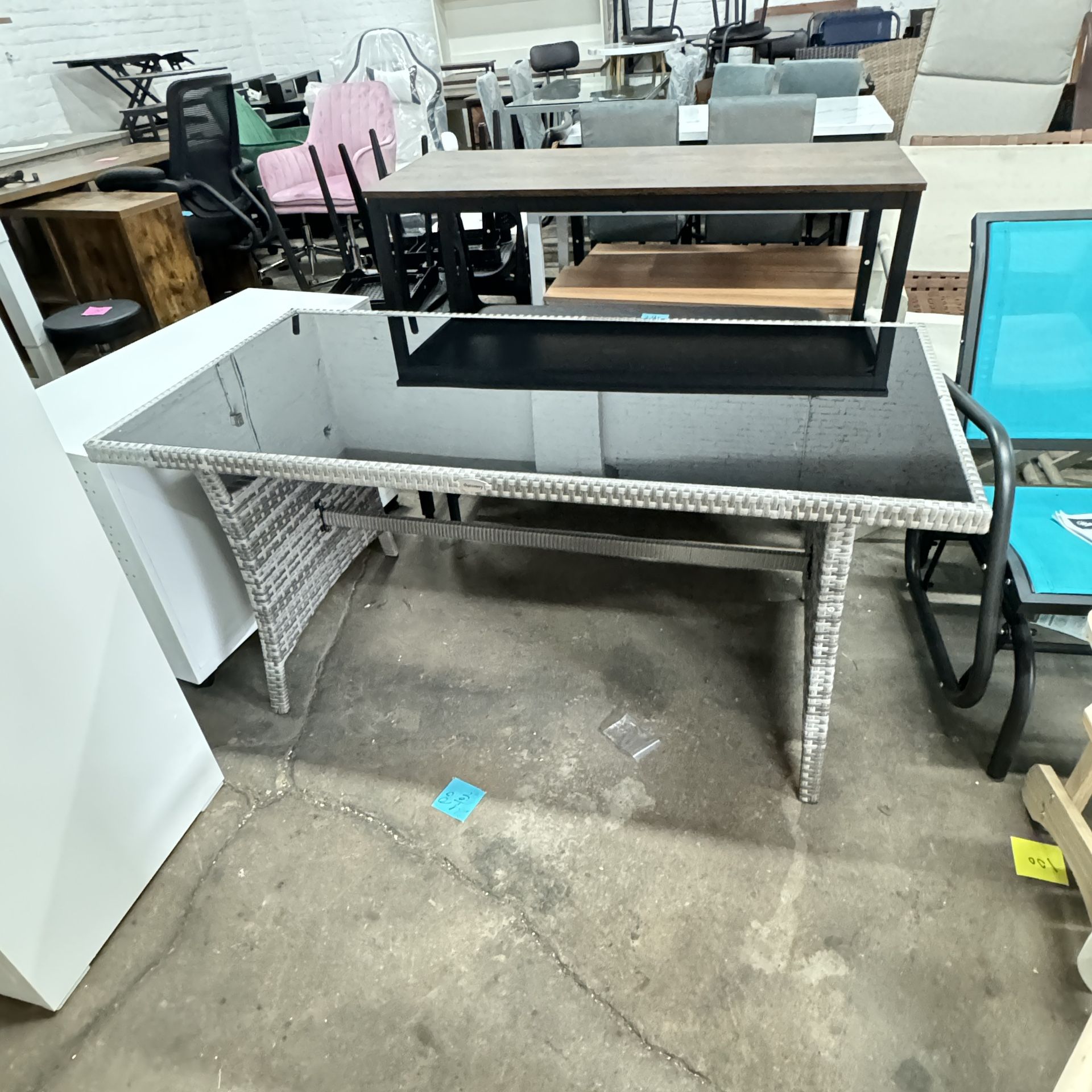 Outdoor table with glass top ( 55Wx27.5Dx26.8H)