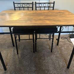 Dining Room Table And 4 Chairs