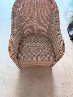 wicker barrel chair (also frequently called a rattan tub chair or wicker armchair