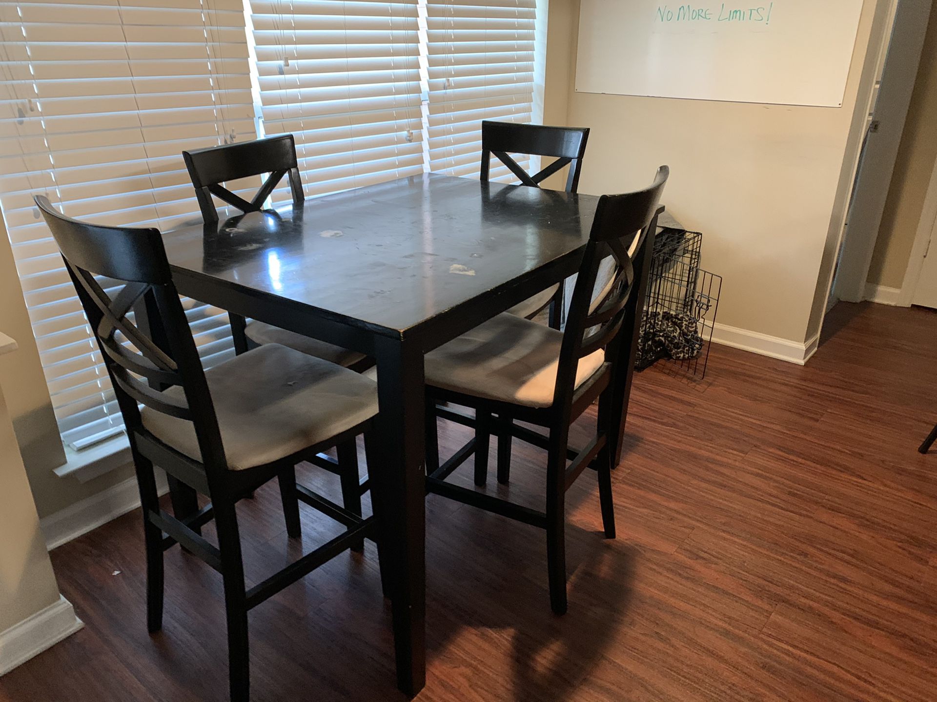 Wooden Kitchen table, with four suede seats.