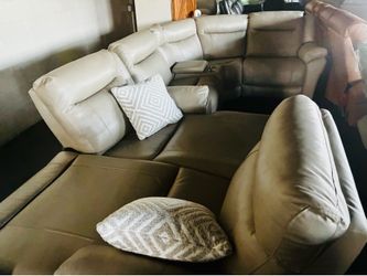 Tan recliners set.