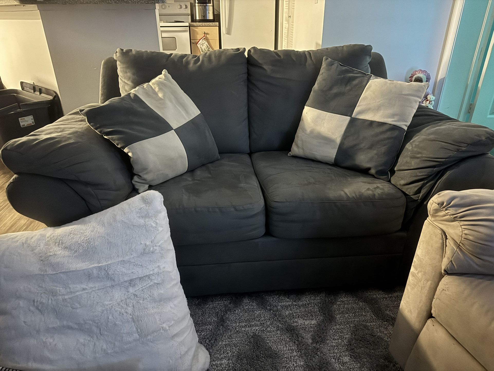 Suede Sofa And Recliner With 2 Matching Pillows.