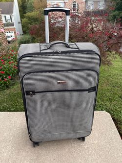 Suitcase. Large, 30” spinner. Great quality and brand, London Fog.