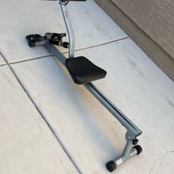 Sunny Health & Fitness Compact Adjustable Rowing Machine with 12 Levels of Resistance for Complete Body Workouts