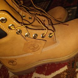 Timberland boots in good shape like new worn once or twice comes with Tommy Hilfiger slides $100