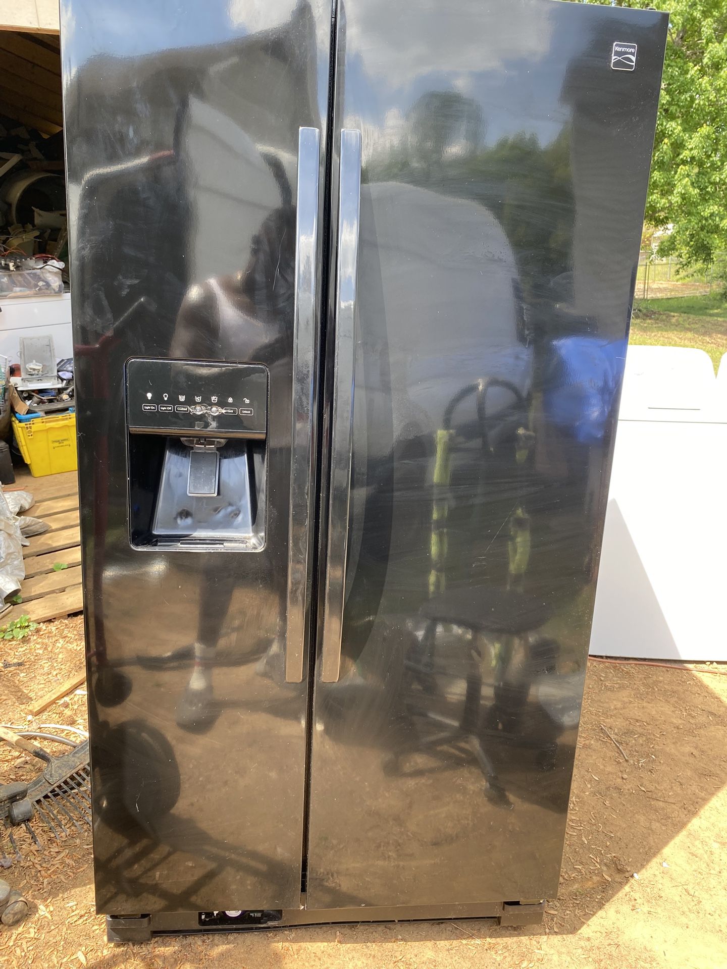 Black double door refrigerator works excellent no issues besides the light lights sometimes $169