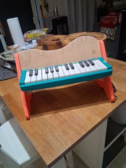 B. Toys Mini Maestro Wooden Toy Piano