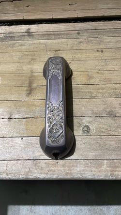 Vintage silver plate phone cover.