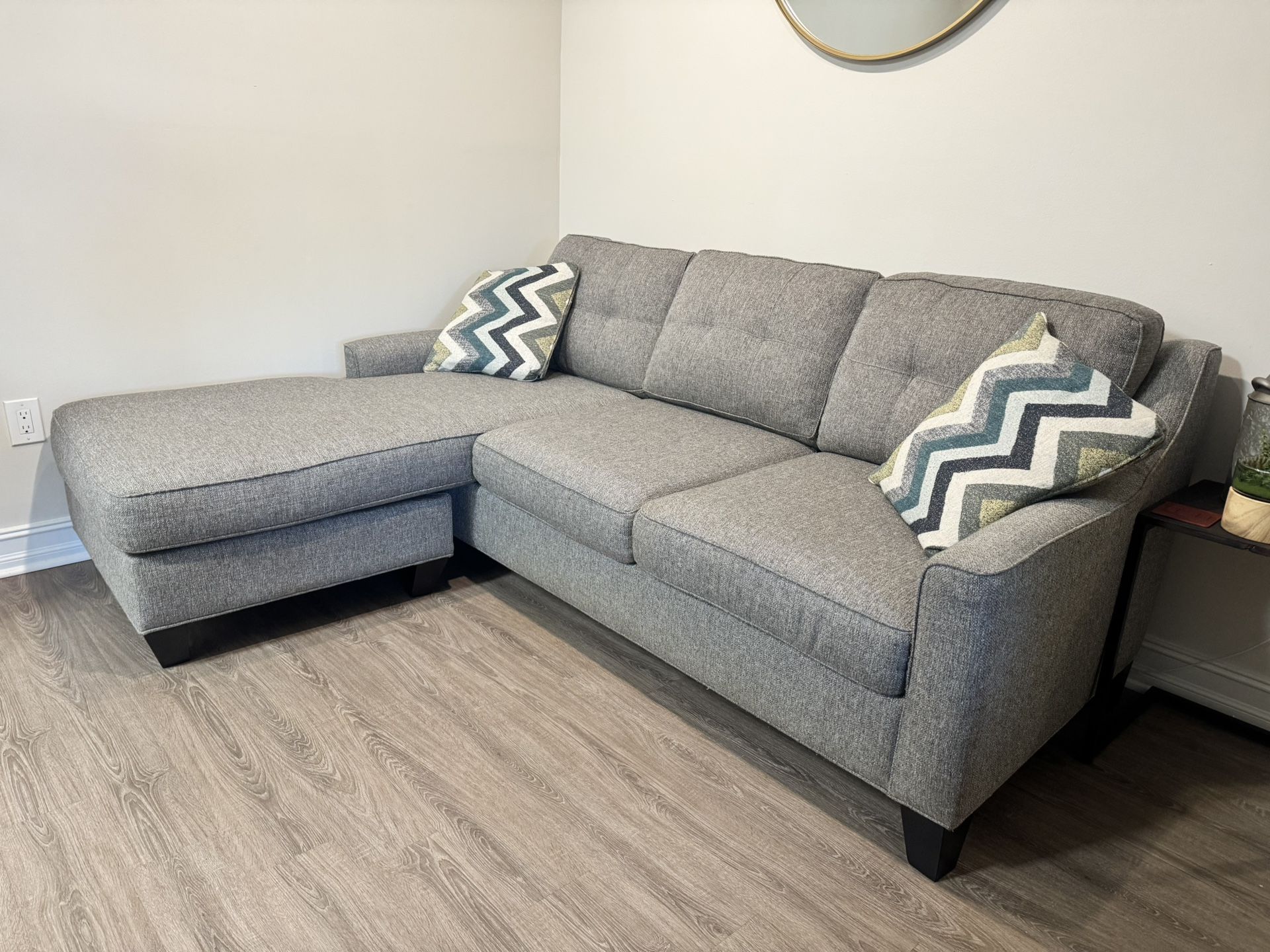 Sectional sofa with reversible ottoman chaise and pull out sleeper