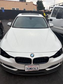 BMW 328D White Sedan