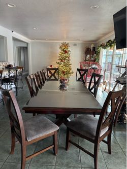 Dining room table with glass top & 8 chairs