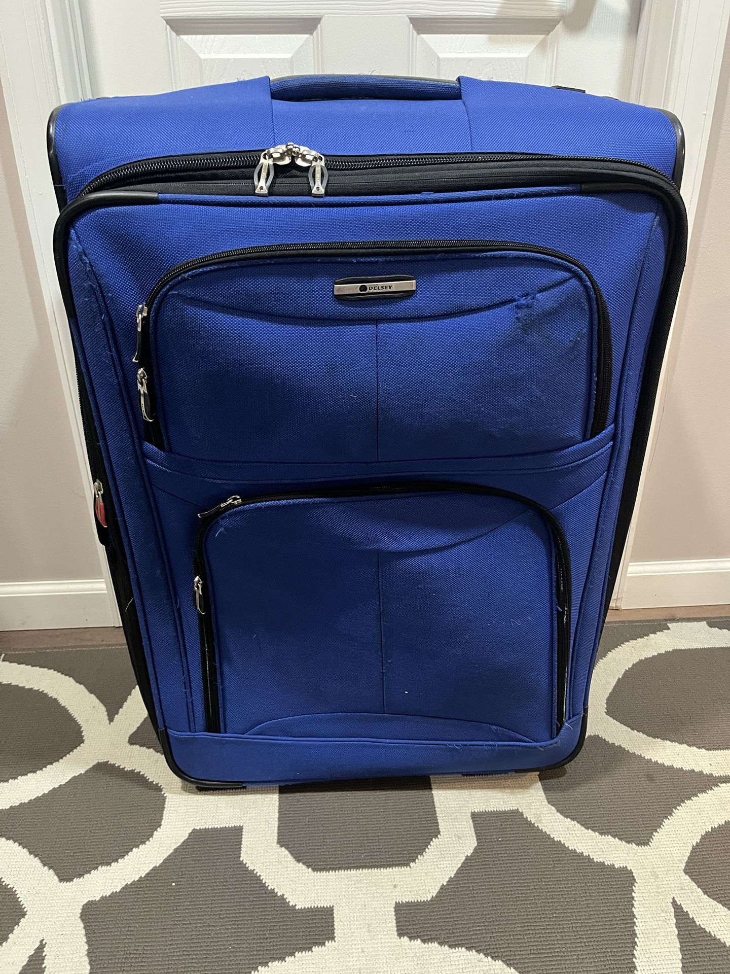 Delsey 2-Wheel Blue Expandable Rolling Suitcase (29”x20.5”x10”)