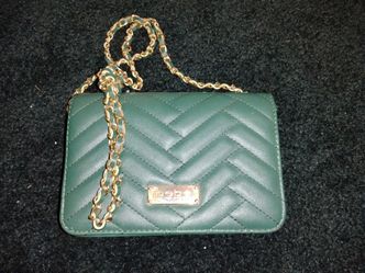 Bebe quilted crossbody/shoulder bag with a gold chain strap