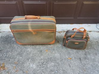 Set of traveling luggage suitcase and carry on