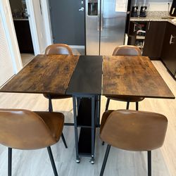Folding dining table