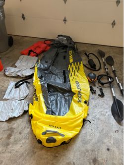 Inflatable kayak and electric pump