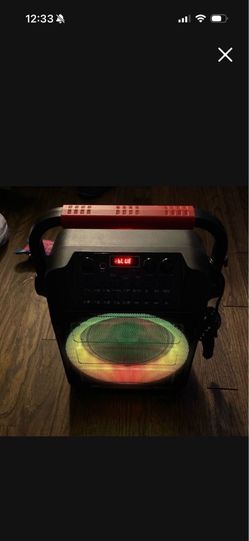 Small karaoke sub works great good bass lights up comes with 2 microphones asking 55