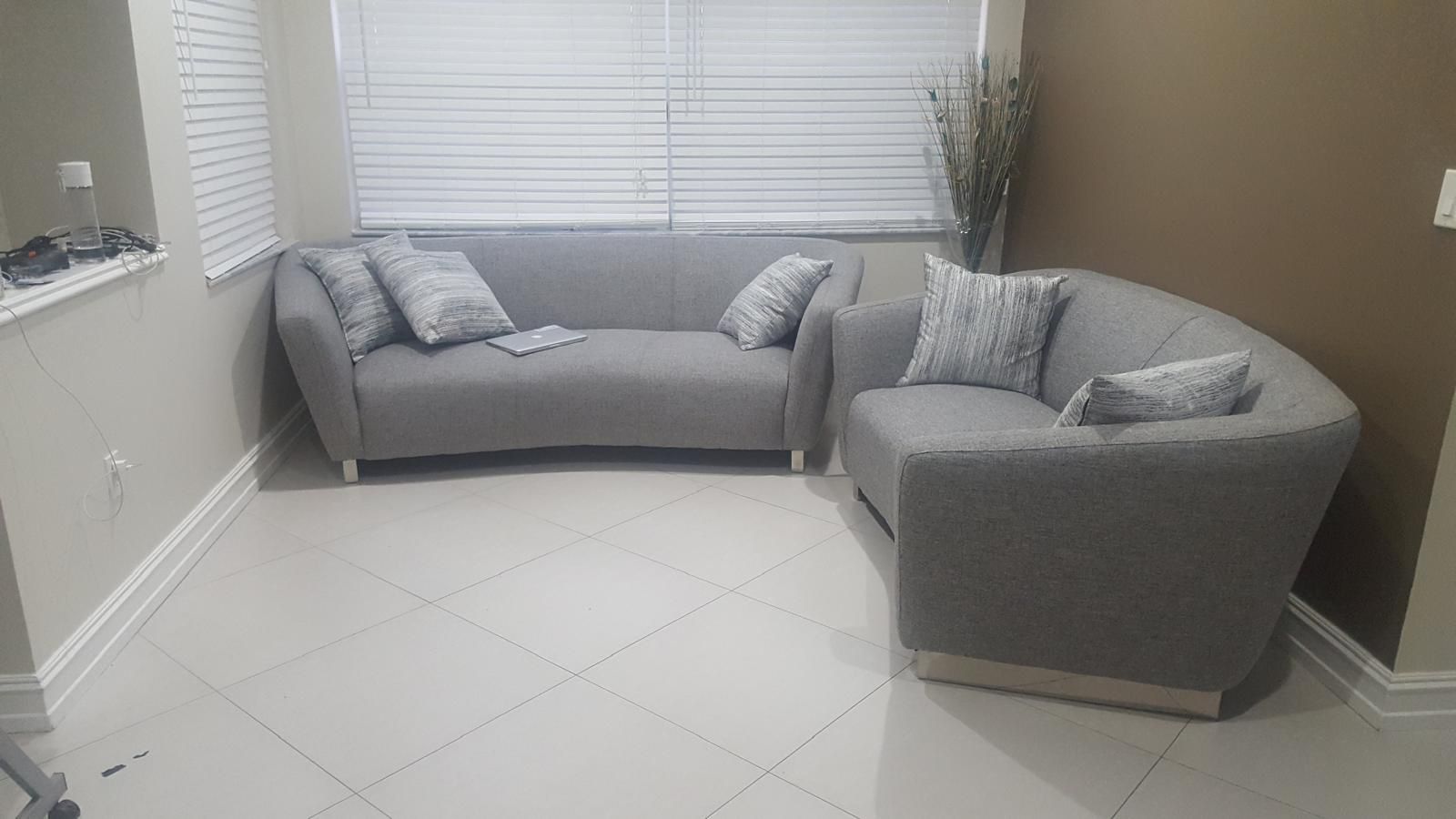 Gray color upholstery sofa and love seat