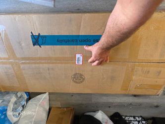 Brand-new TV stand, still in the box—available for anyone interested.