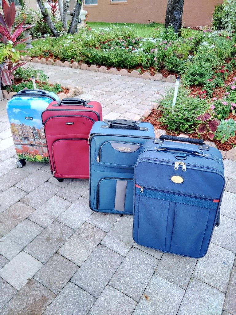21 H Carry On Suitcase. $29 Each