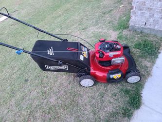 Craftsman lawn mower with 6.75 motor so it can tackle tall grass with ease...starts 1st pull everytime $225cash