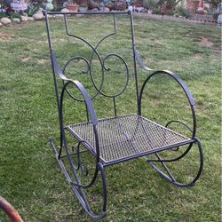 USED WROUGHT IRON ROCKING CHAIR