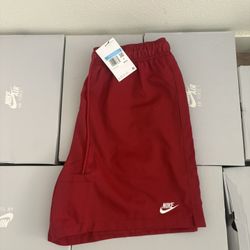 Red/beige Nike Shorts (description)