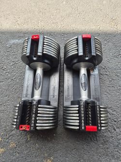 Pair of adjustable dumbbells 50lbs each