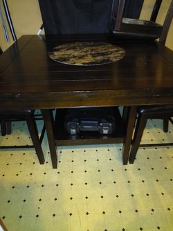 Cherry wood table with memory foam chairs