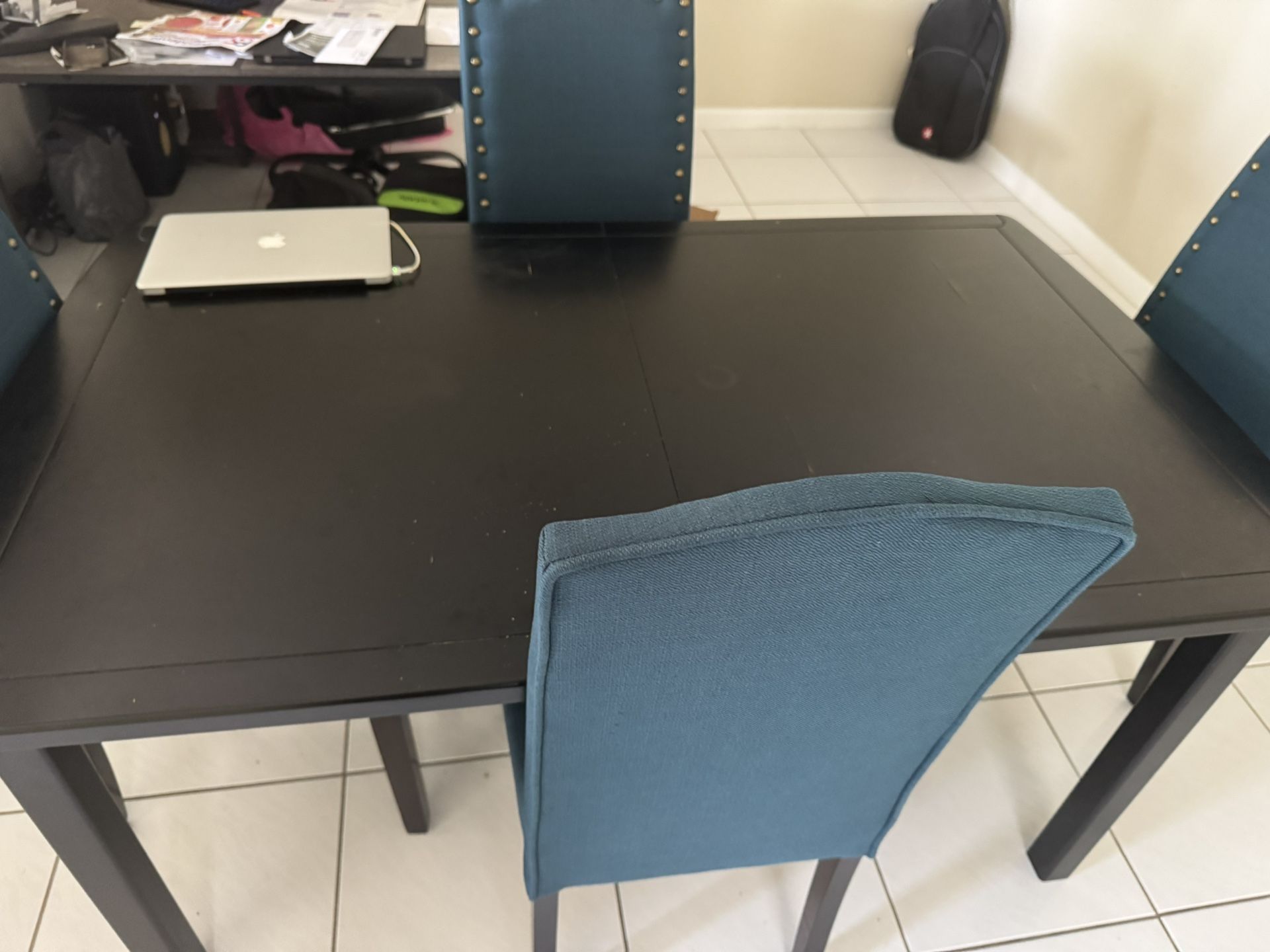 Table With Extra Pieces To Extend Length 