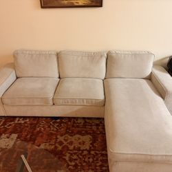 Cream Couch With Storage And Charging Port