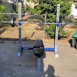 Incline/Decline Bench/Rack+7 ft Barbell +25s, 10s, (4)2.5s