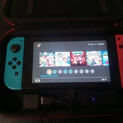 Nintendo Switch + Charging Case